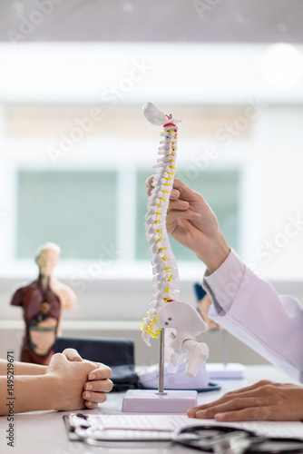 patient experienced pain in the spine and sought advice from a doctor so that the doctor could diagnose and treat the back pain because the back pain made it impossible for him to live his normal life