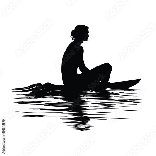 A surfer sitting on their board waiting black silhouette