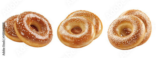 Realistic Freshly baked sesame seed bagels on a white background, showcasing golden brown crust and soft interior texture