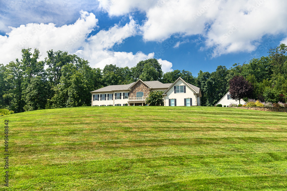 Luxurious country mansion among trees. landscape overlooking field house and clouds. Luxurious country mansion among trees. landscape overlooking field house and clouds.