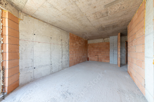  Interior of Unfinished Apartment with Brick Walls and Concrete Ceiling – Under Construction Residential Building, Real Estate Development, Industrial Architecture Background
