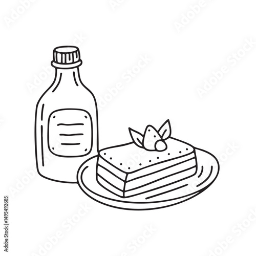 A tiramisu dish beside a bottle of syrup