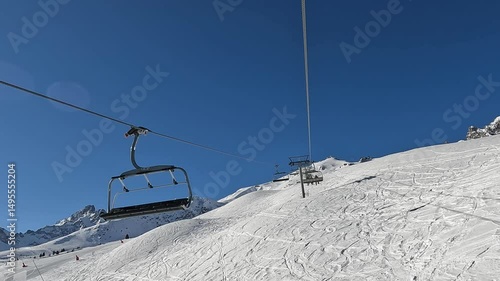 Ski lifts going up and down in Courchevel ski resort