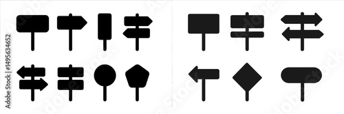 Collection of blank directional signs in various shapes and orientations on a simple background