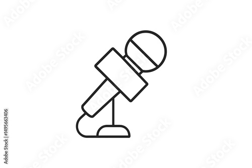 Microphone in a studio setting used for recording music or podcasts in a professional environment during daytime hours