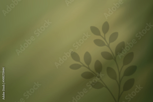 Leafy branch shadow on green background in soft light