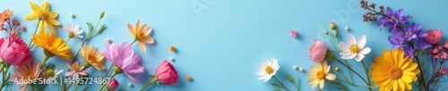 Delicate dried flower garland, blue background ,  wooden dowel,  dried flowers
