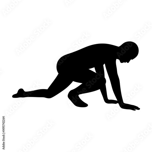 Silhouette of a person in a starting position getting ready to sprint