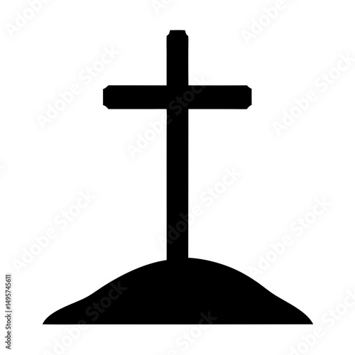 Black silhouette of Christian cross on a small mound of earth