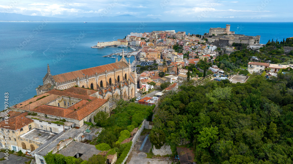 Obraz premium Skyline of the historic center of the town of Gaeta, overlooking the Mediterranean Sea. It's a tourist destination in province of Latina, Lazio, Italy. In foreground there is the temple of St. Francis