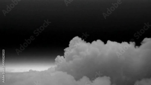 Dramatic Monochrome Cloudscape: Captivating Black and White Sky with Fluffy Clouds and Textured Silhouette