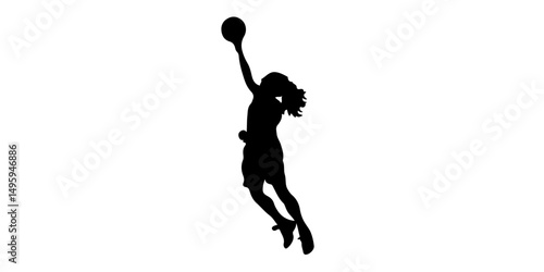 Silhouette of female basketball player jumping with ball
