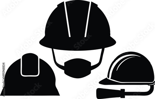 Black and white safety hard hats with face mask, showing worker safety gear.
