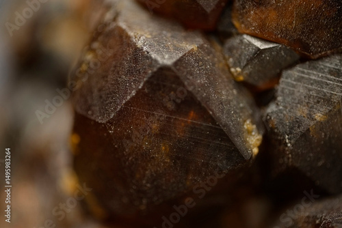 Garnet (andradite, hessanite) crystals. Sinyaya Rechka deposit, Far East, Russia. High magnification microphotograph- photo scale 10X.