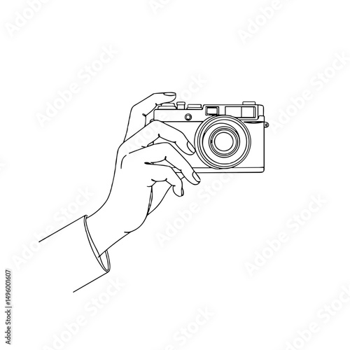 Hand holding a vintage camera ready to take a photo on a plain white background