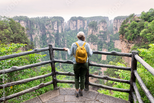 Obraz na plátně Young female tourist  enjoying mountain view, the Zhangjiajie National Forest Pa