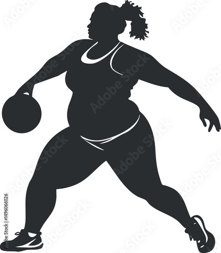 Silhouette of an athletic woman playing basketball holding the ball in a dynamic pose