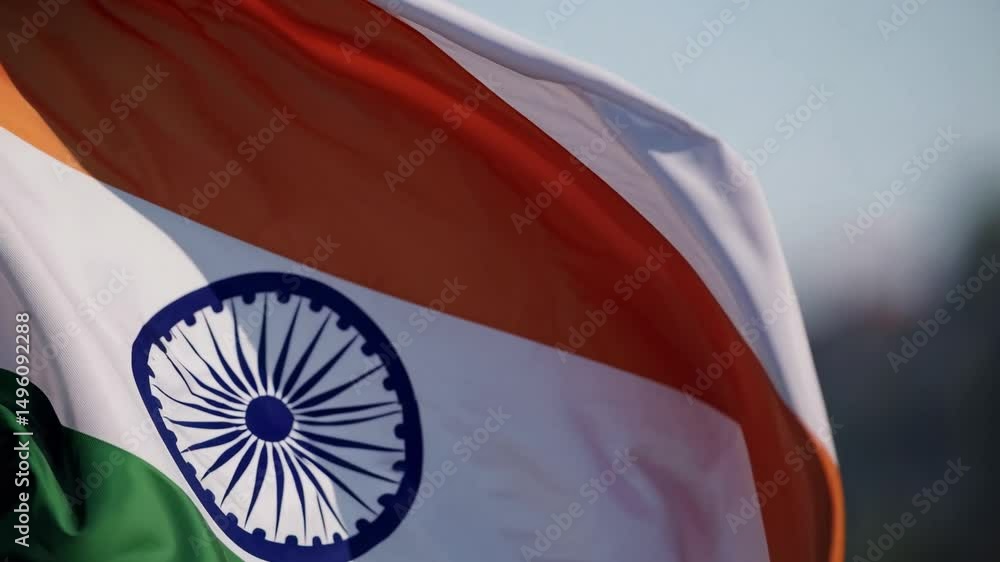 Indian flag weaving slowly, close fabric background
