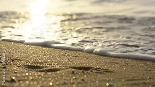 Wallpaper Mural Golden Sand and Gentle Waves: A Serene Beachscape at Sunrise or Sunset Torontodigital.ca