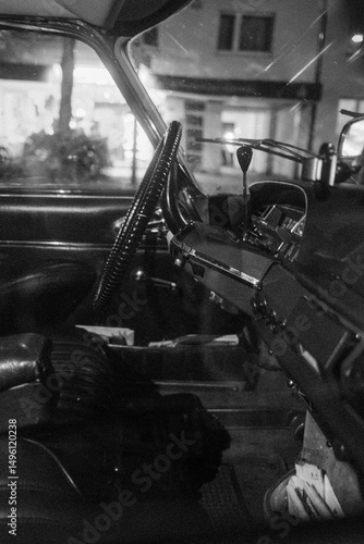 black and white photo of a car