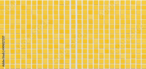 Seamless texture of small matte yellow ceramic mosaic tiles with white grout, empty, matte