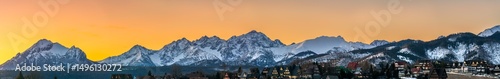 Tatra mountains peak at sunrise seen from Murzasichle village. Winter in Polish mountain region