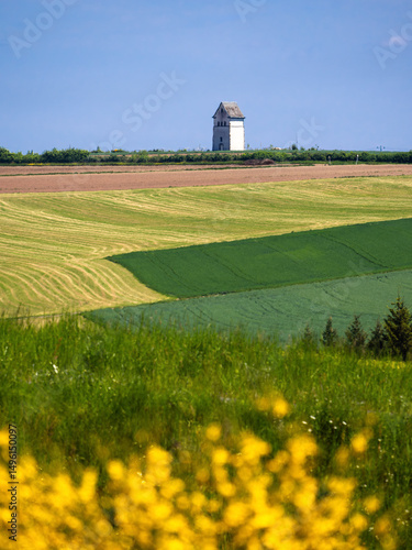 Scenic Landscape of Luxembourg with Tower and Rolling Fields