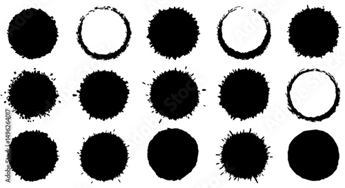 Ink Splatter Circular Design Elements: An abstract, high-angle view of an arrangement of various black ink splatter circles, artfully arranged.