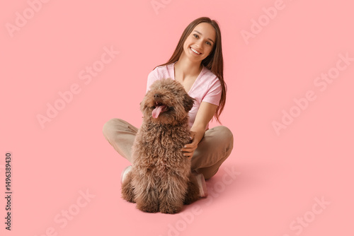 Young woman with brown Pood...