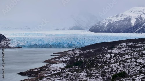 Wallpaper Mural Perito Moreno Glacier In El Calafate Santa Cruz Argentina. Aerial View Of Massive Glacier Calves Into A Lagoon Of Icy Water. Nature Travel Destination Snow Covered Forest Trees. Torontodigital.ca