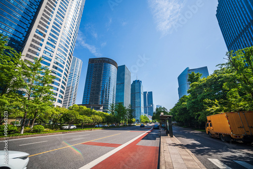 A Vibrant Cityscape: Modern Architecture Meets Lush Greenery