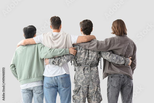 Group of young men and sold...