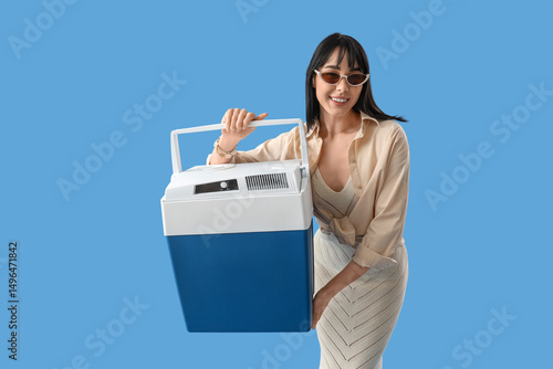 Young woman with portable f...