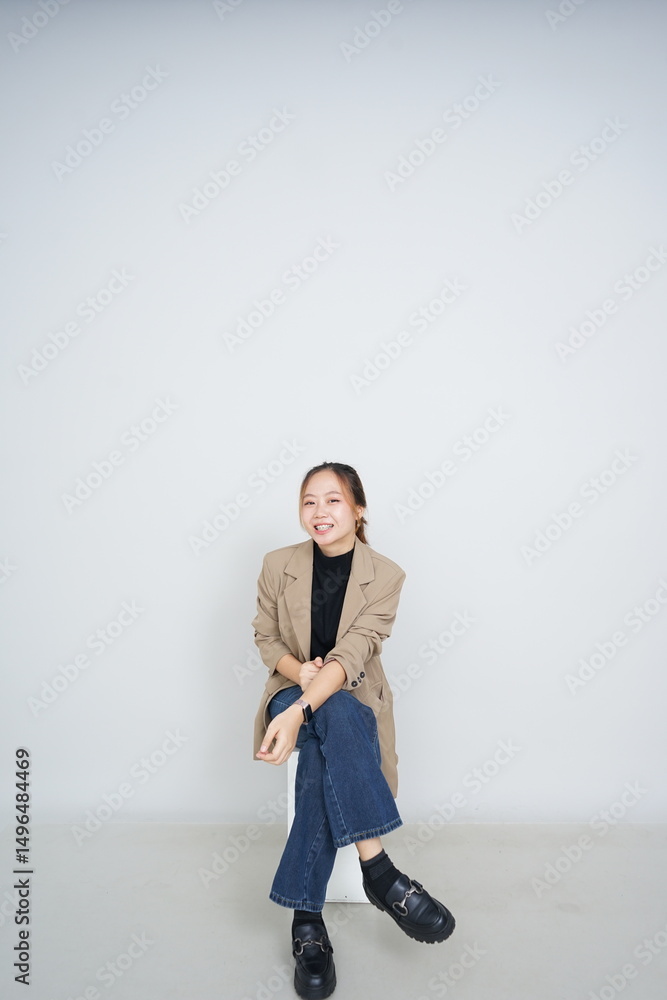 asian model doing photoshoot on white bakcground asian model doing photoshoot on white bakcground