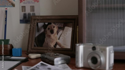 Retro camera and props on a wooden table.