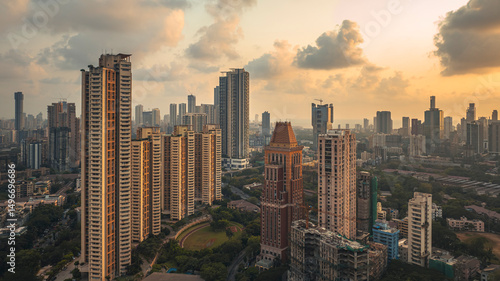 Modern City high-rise skyscraper buildings in Mumbai, a beautiful yellow evening shot. Cloudy sunset in Mumbai City, India