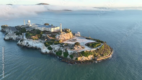 Alcatraz Island In San Francisco California United States. Lighthouse Standing Tall On Beach With Ocean Waves Crashing. Industry Skyline Skyscrapers Vibrant. Industry Cityscape.