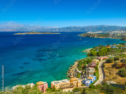 View of Candia, Havania and Mirabello beaches with offshore Agioi Pantes Island (Agios Nikolaos, Crete, Greece)