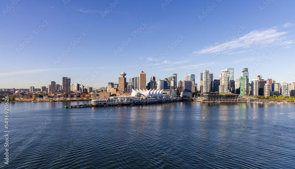 Fototapeta premium Beautiful View of Downtown Vancouver Skyline Over Calm Harbor Waters