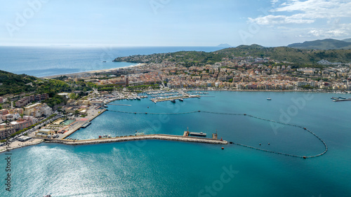 Aerial view of the Gaeta port, overlooking the Mediterranean Sea. It is located in the province of Latina, Lazio, Italy. In background is the Serapo beach.