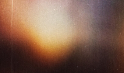 grainy colorful warm rainbow red light leaks on black background with dust texture. abstract damaged scratched retro film analog effect for using over photos as overlay or screen filter