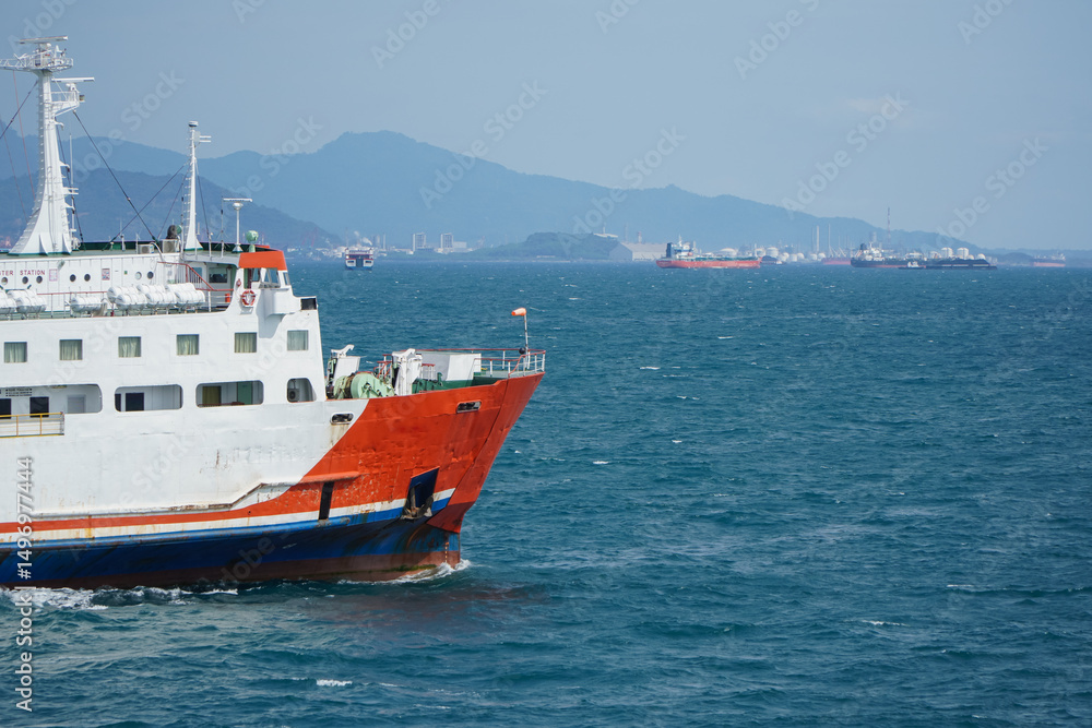 custom made wallpaper toronto digitalContainer Ship Navigating Through Calm Ocean Waters Near Coastal Mountains