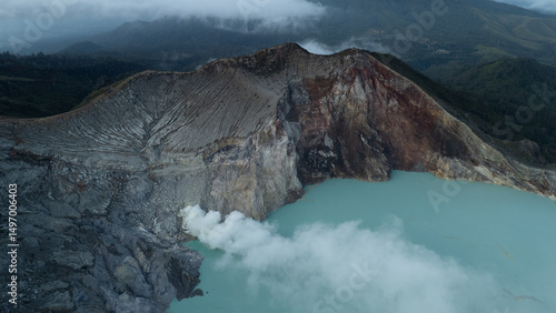 aerial view of the interior of a volcano crater, with a lake of sulphur. Java, Indonesia - 19th March 2025