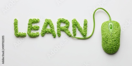 Green noodles creatively form the word learn with a matching computer mouse on a clean background