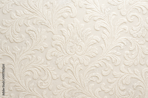 Elegant cream damask fabric with an embossed floral pattern and soft texture. This classic woven textile is ideal for use in upholstery, interior design, fashion accents, as a decorative backdrop
