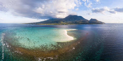 Aerial view of white island sandbar in front of Camiguin Island, Philippines