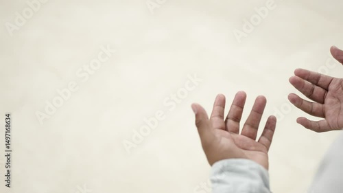 Innovative professional wearing advanced virtual reality headset, stunned by the way his hands look in imaginary scenario