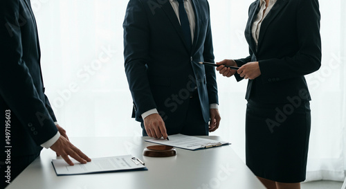 Lawyers review documents before signing