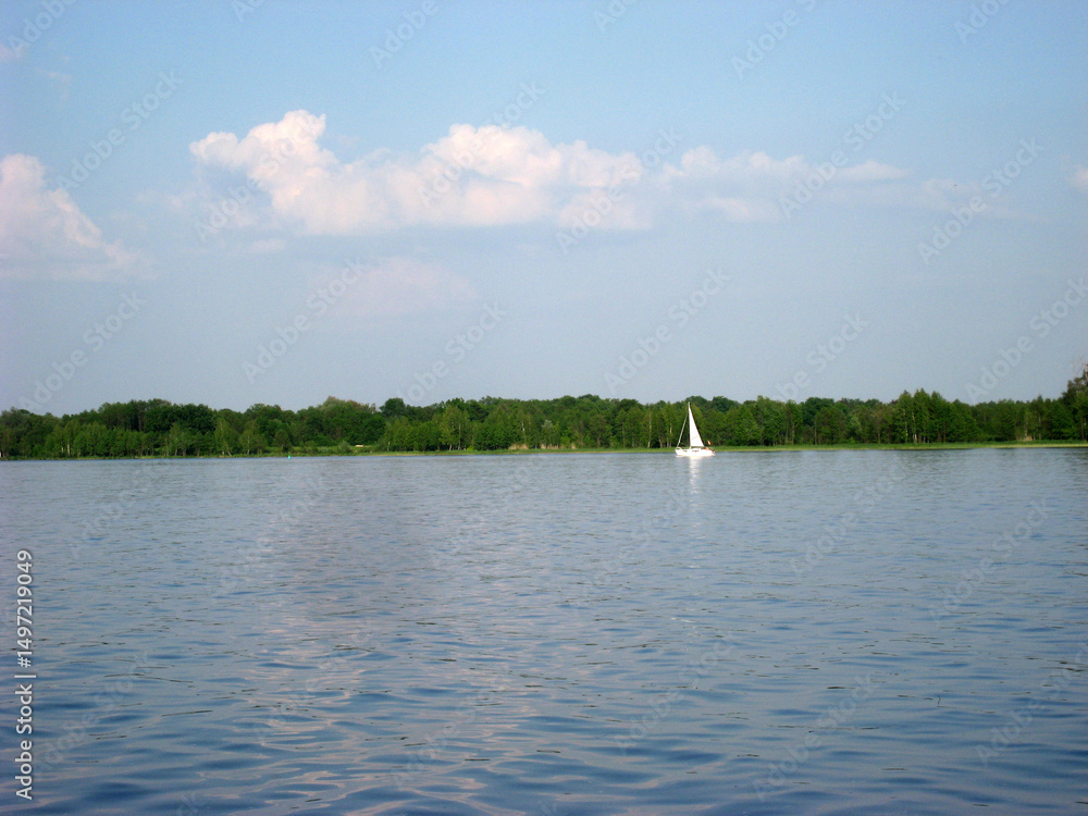 sailboat boat floats on the lake