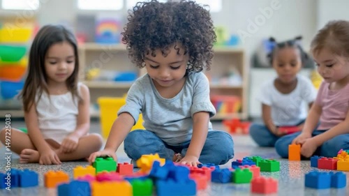 Playtime at Daycare: A group of diverse children, immersed in a world of colorful building blocks, engaged in imaginative play, fostering creativity and early childhood development.